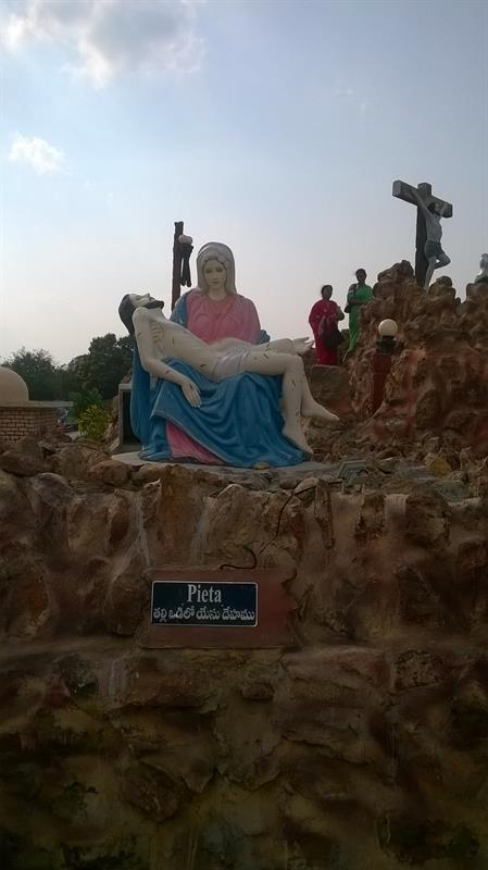 Pieta- Virgin Mary cradling the dead body of Jesus as seen in Holy Land, Pinakadimi, Eluru, A.P.