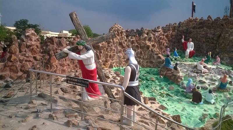 "Jesus loaded with a cross"- A beautiful scene seen at Holy Land, Pinakadimi, Eluru, A.P., India