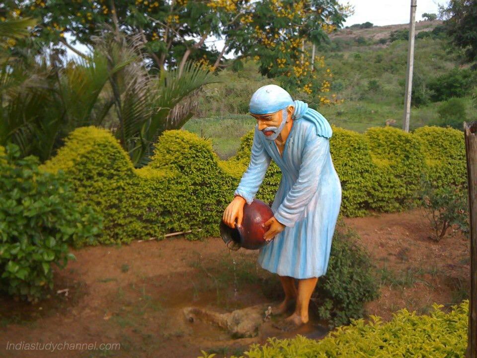 Lord Sai idol in deshmukhi sai baba temple garden