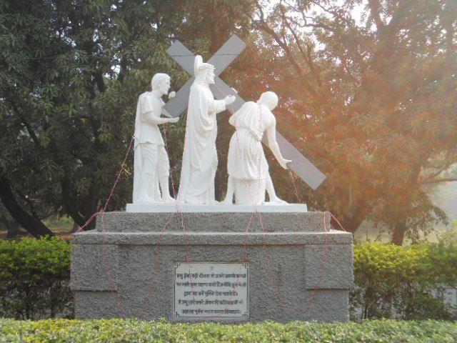 Simon of Cyrene helps Jesus carry the Cross