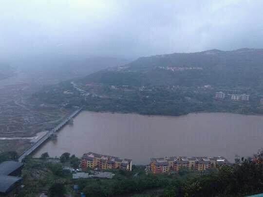 View of beautiful Lavasa City surrounded with black clouds.
