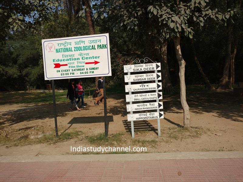 Sign board showing entry timing, National zoological park.